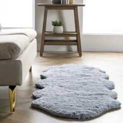 NuLOOM Hand Tufted Double Pelt Faux Sheepskin Area Rug, Shaped 2' X 6', Baby Blue -Baby Trend Store GUEST 8a3f608e 515a 4428 977e 7e559c17346c